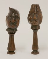 Lot 76 - Two treen caricature nutcrackers