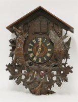 Lot 266 - A 'Black Forest' cuckoo wall clock
with carved dead hare and woodcock