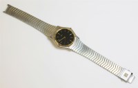 Lot 605 - A gentleman's bicolour Ebel Classic Waves quartz bracelet watch