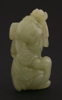 Lot 172 - A celadon jade Boy