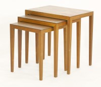 Lot 590 - A nest of three Danish teak tables