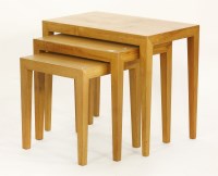 Lot 622 - A nest of three Danish teak tables