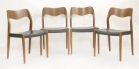 Lot 629 - A set of four teak and leather dining chairs