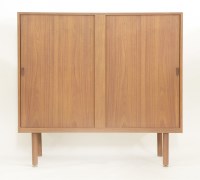 Lot 657 - A teak cupboard