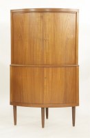 Lot 659 - A Danish teak corner cupboard