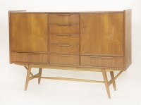 Lot 662 - A Danish teak high sideboard