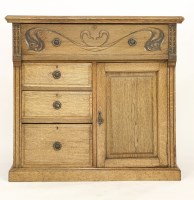 Lot 71 - An Arts & Crafts oak secretaire