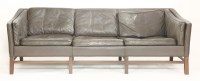 Lot 598 - A brown leather three-seater settee