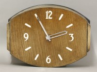 Lot 246 - An Art Deco lozenge-shaped electric wall clock