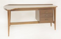 Lot 602 - A teak desk
