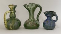 Lot 44 - Three Elton 'Sunflower' pottery jugs