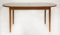 Lot 679 - A teak dining table