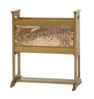 Lot 59 - An Arts and Crafts oak magazine rack