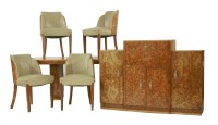 Lot 186 - An Art Deco burr maple dining room suite
