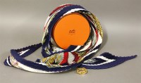 Lot 68 - An Hermès boxed plissé silk scarf