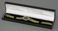 Lot 10 - A lady's white gold-plated Raymond Weil mechanical bracelet watch
