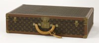 Lot 177 - A Louis Vuitton hinged hard sided suitcase