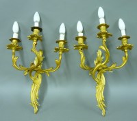 Lot 1215 - A set of six gilt bronze triple wall light brackets