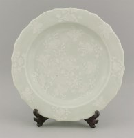 Lot 76 - A celadon Dish