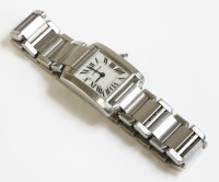 Lot 529 - A ladies' stainless steel Cartier Tank Française quartz bracelet watch 2384