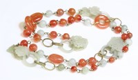 Lot 386 - An Asian jade and cornelian necklace