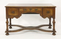 Lot 675 - An 18th century style mahogany desk