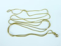 Lot 33 - A long gold fox tail chain