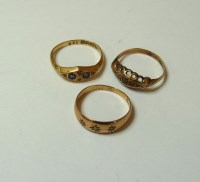 Lot 7 - An 18ct gold sapphire and diamond boat shaped ring
