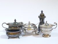 Lot 111 - A three piece silver cruet set