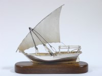 Lot 157 - A silver model of a dhow
