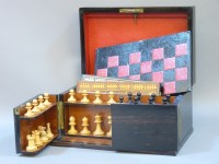 Lot 211 - A Victorian coromandel wood games compendium