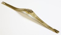 Lot 476 - A ladies' 18ct gold Omega mechanical bracelet watch