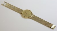 Lot 467 - A gentlemen's 18ct gold Baume et Mercier Genève mechanical strap watch