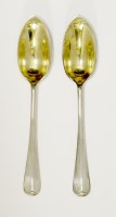 Lot 129 - A set of six silver rat tail pattern grapefruit spoons