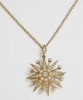 Lot 354 - A late Victorian diamond and split pearl gold starburst brooch pendant