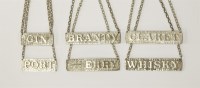 Lot 66 - A set of six silver wine labels