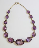 Lot 288 - A late Victorian amethyst and gold rivière