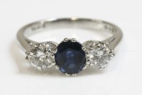 Lot 450 - A platinum sapphire and diamond three stone ring