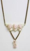 Lot 352 - A carved coral gold necklace