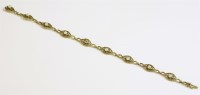 Lot 365 - A French gold and pearl set bracelet