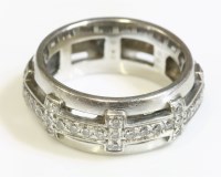 Lot 520 - A diamond set band ring