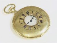 Lot 385 - An 18ct gold slimline half hunter pocket watch