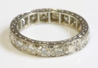 Lot 380 - A diamond set full eternity ring