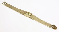 Lot 420 - A ladies' 9ct gold Omega mechanical bracelet watch