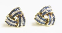 Lot 451 - A pair of 14ct gold sapphire and diamond knot earrings