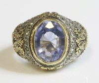 Lot 312 - A gentlemen's gold and silver sapphire and diamond ring