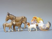 Lot 261 - Three Beswick china donkeys
