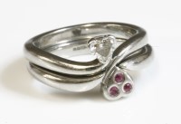 Lot 17 - A platinum diamond and sapphire crossover ring
