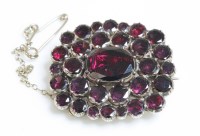 Lot 262 - A Georgian garnet set gold brooch of rectangular cushion form