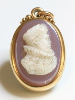 Lot 357 - A Victorian double-sided carved hardstone cameo locket